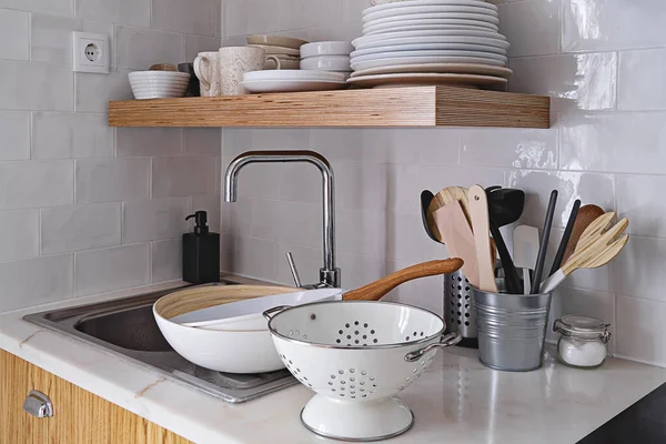 Modern kitchen with white brick tile wall in Scandinavian style