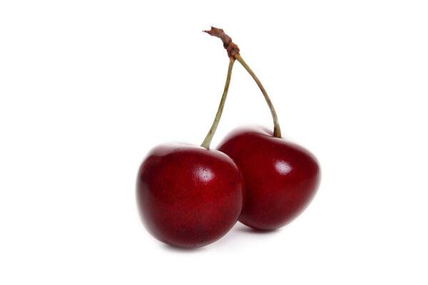 Fresh cherries with leaf isolated on white background