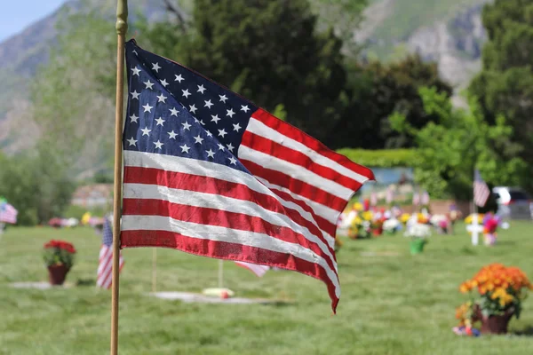The U.S. flag flying at a cemetery in Provo, Utah during Memorial Day.