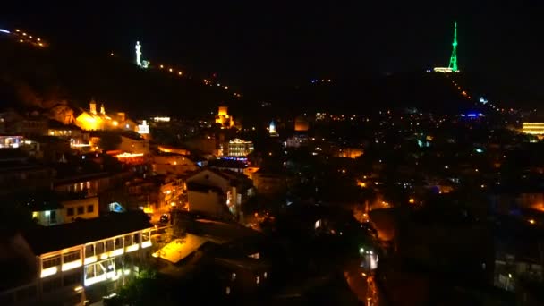 A panorama of the night colorful city from the funicular — Stock Video