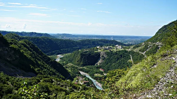 Mountain peak range landscape. Green mountain range view. Mountain peak blue sky white clouds panorama