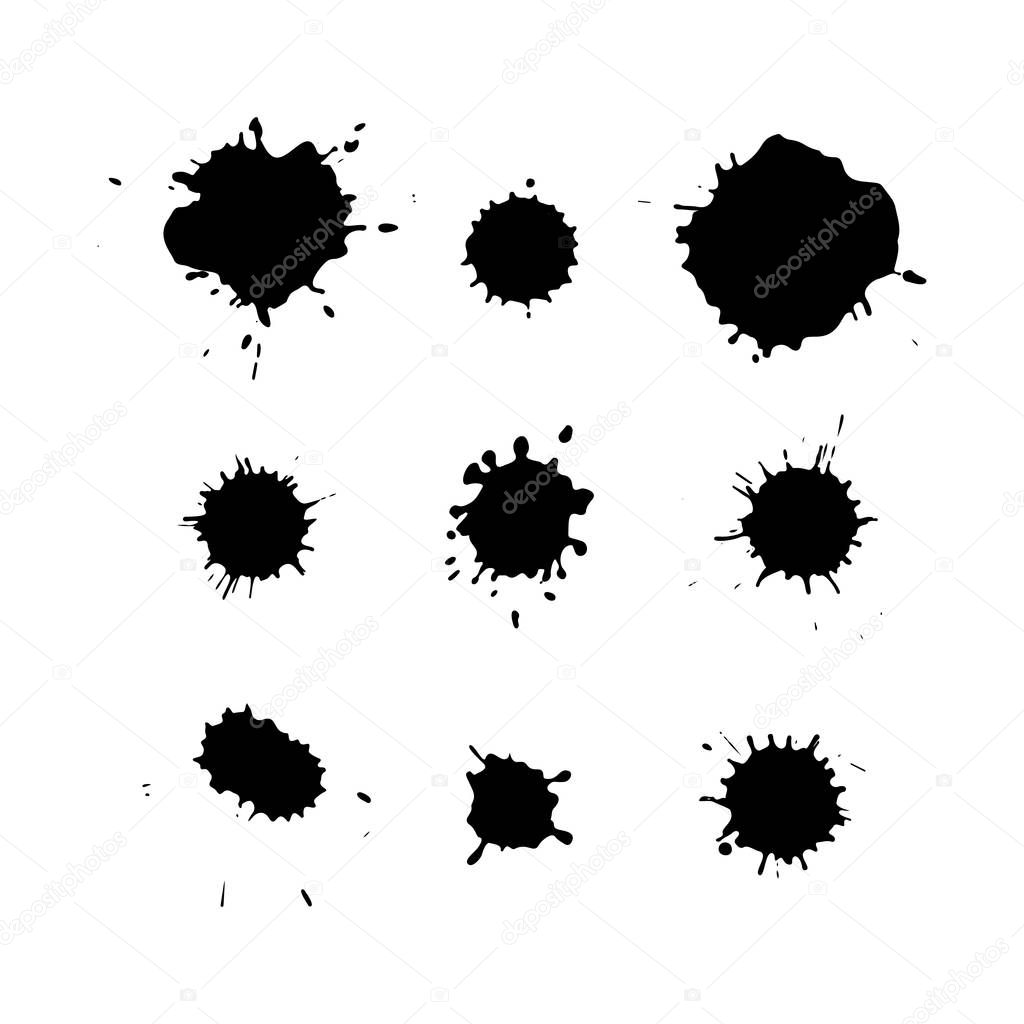 Black ink blots isolated on white background. Splashes texture.