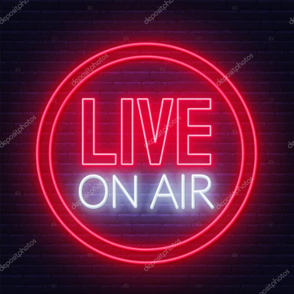 Live on air glowing neon sign on brick wall background.