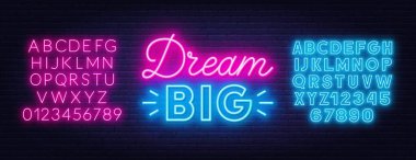 Neon harfli rüya büyük. Koyu arkaplanda neon alfabesi.