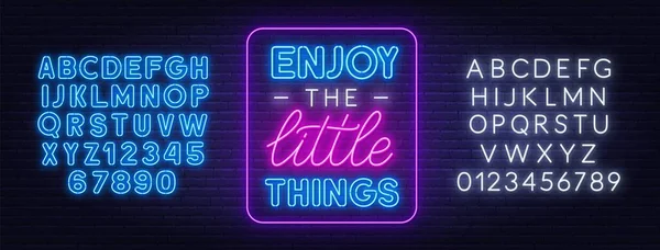 Enjoy the little things neon inspirational quote on a brick wall background. — Stock Vector