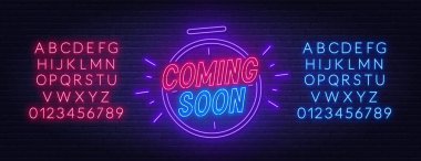 Yakında saatli neon ışığı gelecek. Kırmızı ve mavi neon alfabeler.