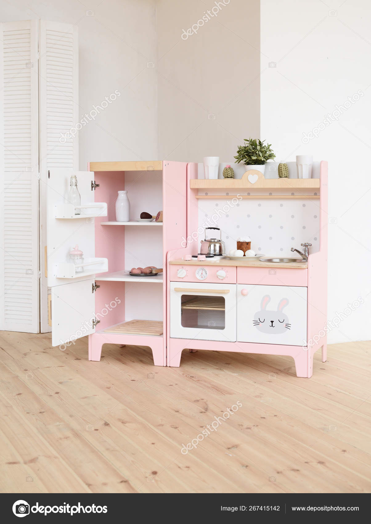 pink and white wooden kitchen