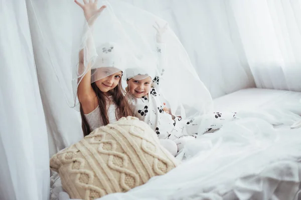 Children Soft Warm Pajamas Playing Bed — Stock Photo, Image