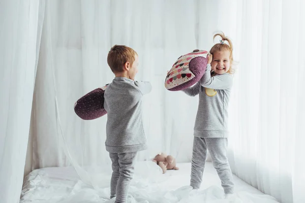 Children Soft Warm Pajamas Playing Bed — Stock Photo, Image