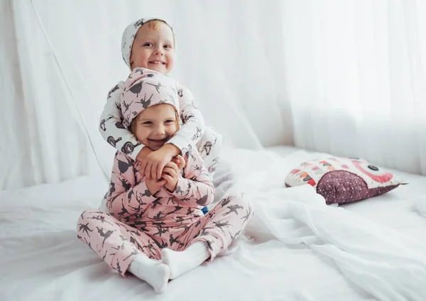 Children Soft Warm Pajamas Playing Bed — Stock Photo, Image