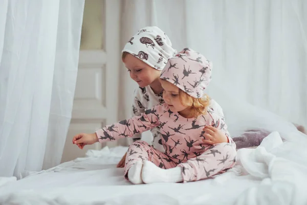 Children Soft Warm Pajamas Playing Bed — Stock Photo, Image