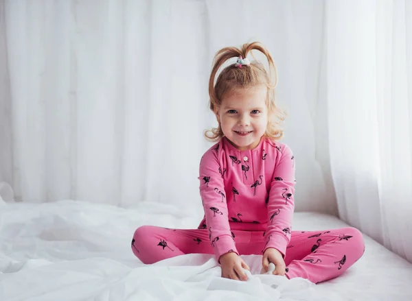 Child Soft Warm Pajama Playing Bed — Stock Photo, Image