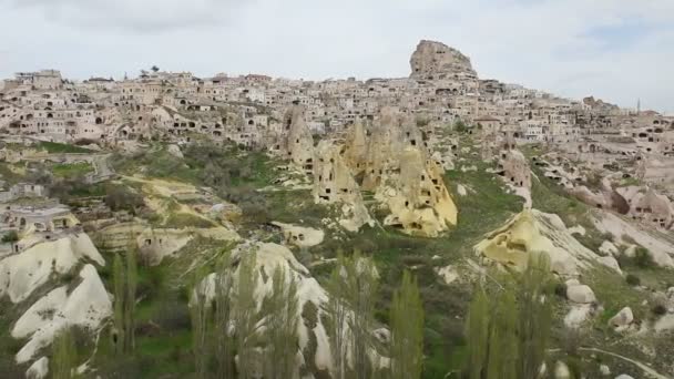 View of cave houses in rock formation at Ortahisar. Cappadocia. Nevsehir Province. Turkey — Stock Video