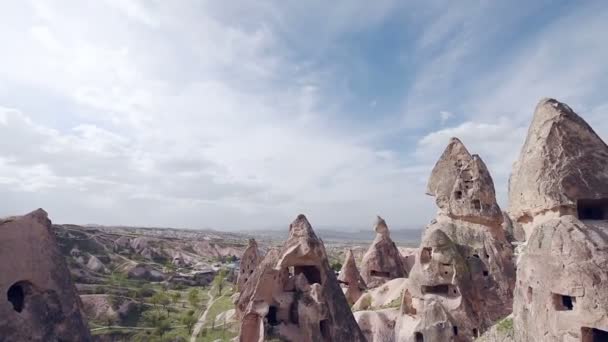 View of cave houses in rock formation at Ortahisar. Cappadocia. Nevsehir Province. Turkey — Stock Video