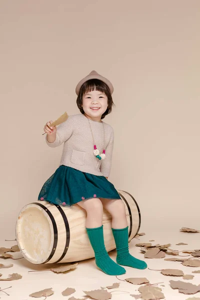 Little Pretty Asian Girl Sitting Autumn Background — Stock Photo, Image