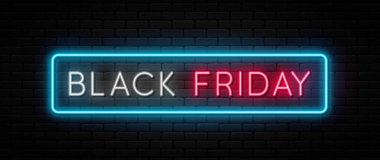 Black Friday sale. Black Friday neon sign on brick wall background. Glowing white and red neon text in blue frame for advertising and promotion. Banner and background, brochure and flyer design