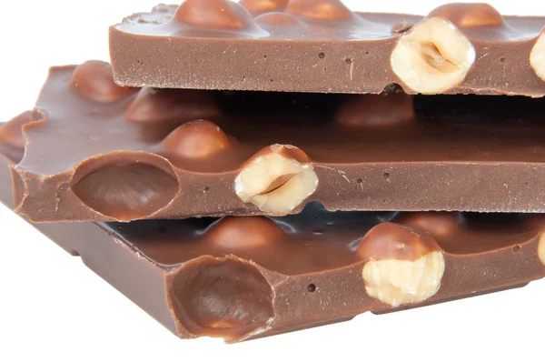 Sabroso Chocolate Con Avellanas Aisladas Sobre Fondo Blanco — Foto de Stock