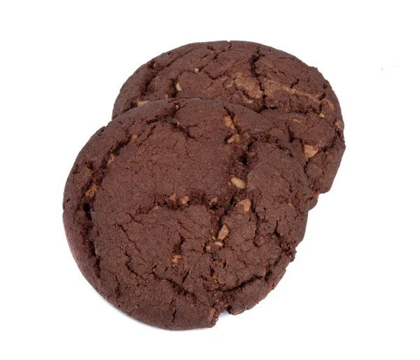 Biscoitos saborosos de chocolate americano com nozes isoladas no branco — Fotografia de Stock