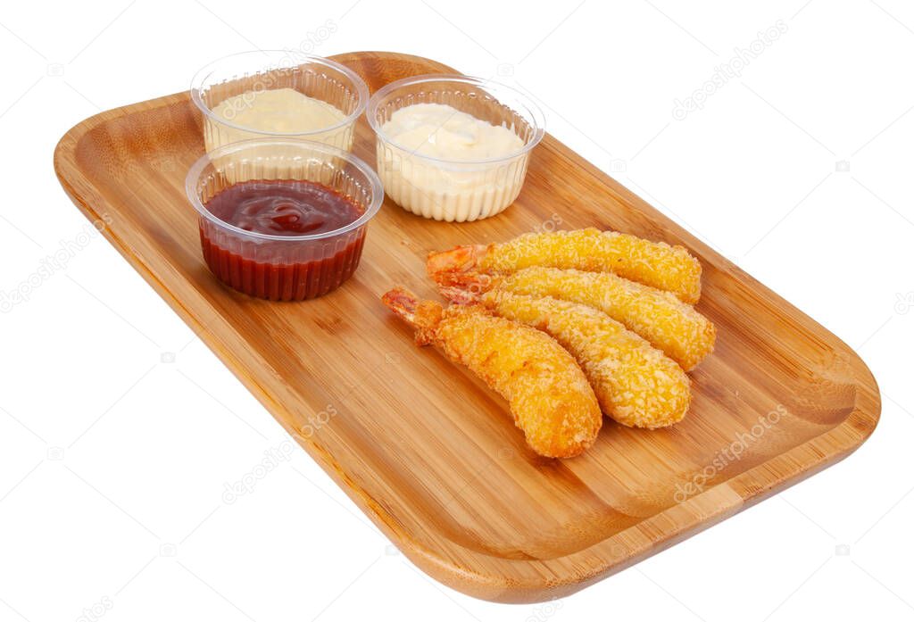 Deep fried fish fingers snacks fastfood on the wooden background