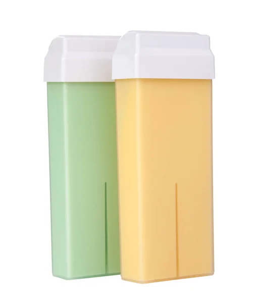 脱毛或脱毛用的墨盒中的绿色和黄色蜡 在白色上隔离 — 图库照片