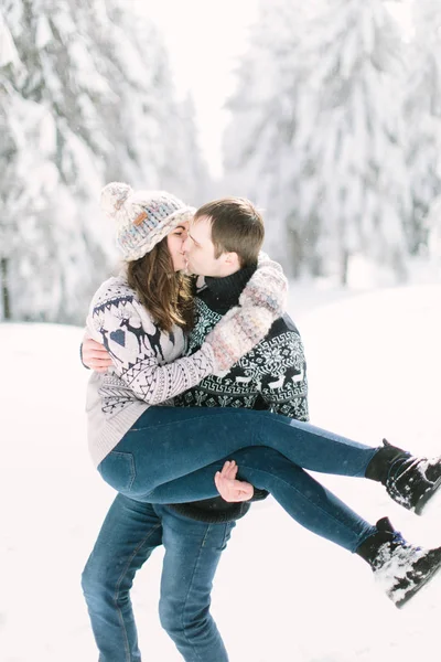 Young Man Holding Girlfriend Hands Cold Snowy Winter Forest — Stock Photo, Image