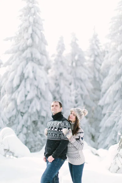 Happy Couple Hugging Snowy Winter Spruce Wood — Stock Photo, Image