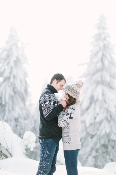 Happy Couple Hugging Snowy Winter Spruce Wood — Stock Photo, Image