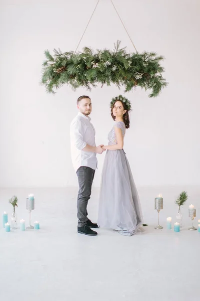 Handsome Groomman Pretty Bridesmaid Hold Hands Stand White Studio Wedding — Stock Photo, Image