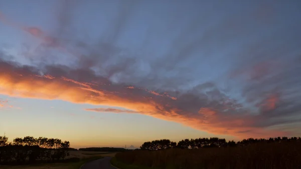 Colorful sunset in the fields at fall