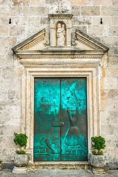 Door to the Our Lady of the Rocks church in Perast