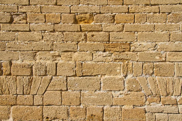 Ancient Very Weathered Brick Wall Background Texture Slight Golden Hue — Stock Photo, Image