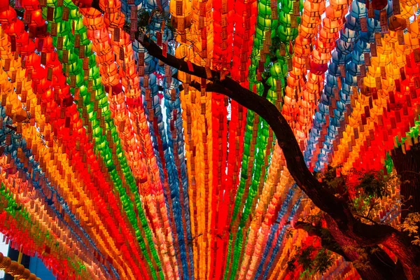 Rows and rows of colorful illuminated buddhist lotus lanterns — Stock Photo, Image