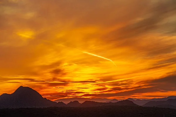 Vivid sunset over the mountains and desert of the Sonoran Desert in Arizona.