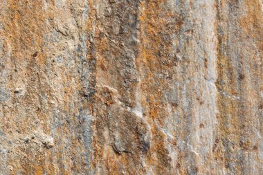 Taş arka plan doku; Doğal taş doku. Arka plan ve doku tasarımcılar için. Kahverengi renk tonu ile taş taş yüzey background.surface, yakın çekim