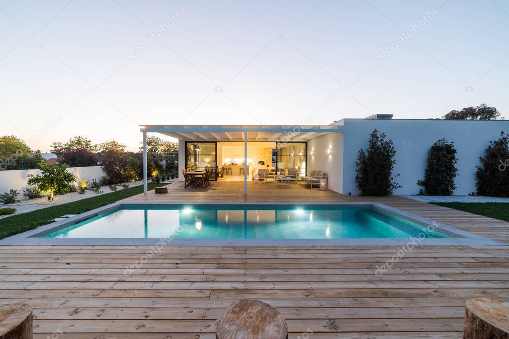 Exterior and interior modern white villa with pool and garden