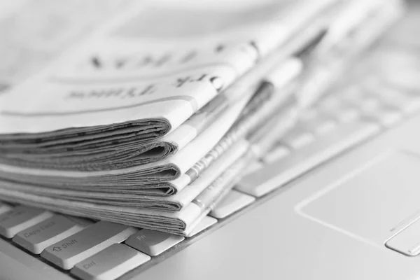 Newspapers Laptop Pile Daily Papers News Computer Pages Headlines Articles — Stock Photo, Image