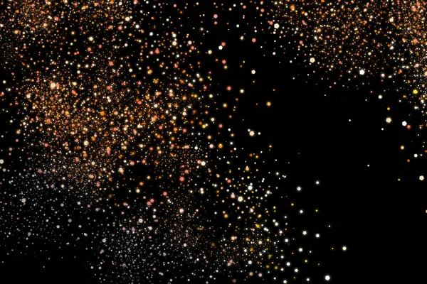 ゴールドラメ爆発 黄金の粒子の飛沫 黒の背景に分離された抽象的なザラザラした質感 — ストック写真