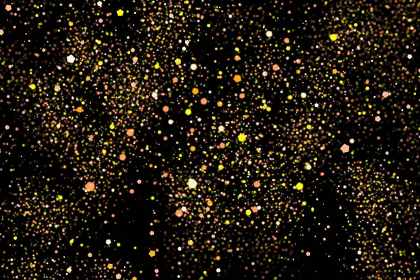 ゴールドラメ爆発 黄金の粒子の飛沫 黒の背景に分離された抽象的なザラザラした質感 — ストック写真