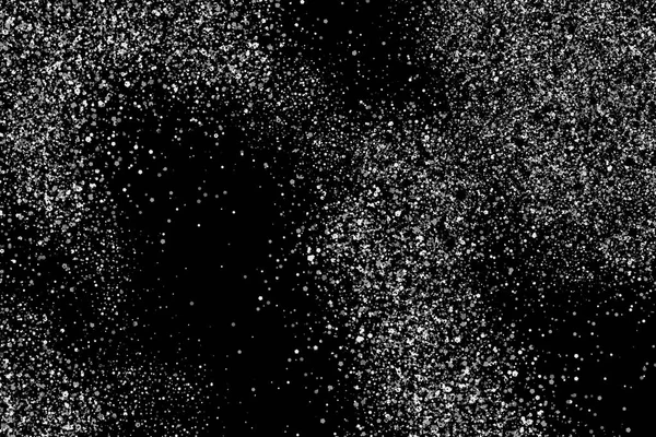 Snow explosion. Abstract grainy white texture isolated on black background. Overlay element for design
