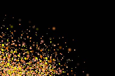 Altın parıltı patlama. Altın parçacıkları sıçraması. Siyah arka plan üzerine izole soyut grenli doku