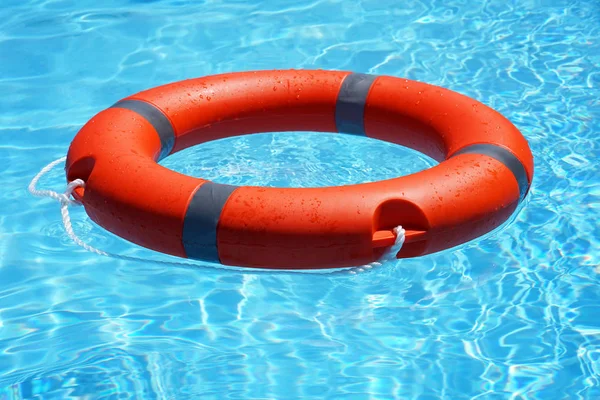 Red Lifebuoy Pool Ring Float Blue Water Life Ring Floating — Stock Photo, Image