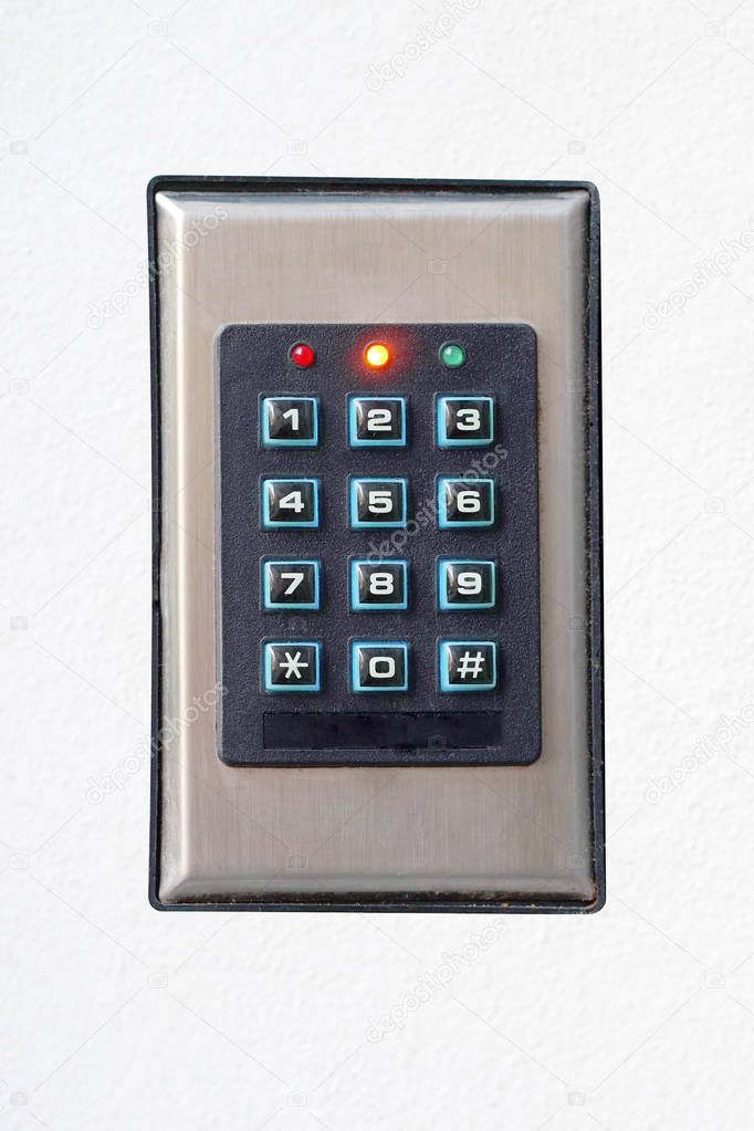 Secure password on keyboard for opening home house door. Isolated. Password code Security keypad system protected in Public Building. The security code combination to unlock the door