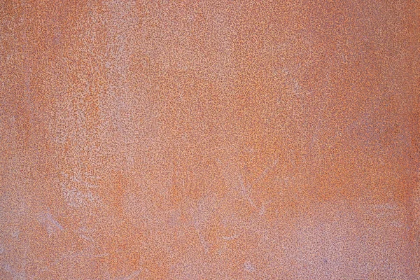 Red metal texture with scratches and cracks. weathered steel textur. close-up rusty metal sheet background, dirty steel plate surface texture. Red old rusty metal sheet with elements, background