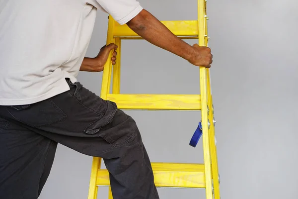 Electrician Male Rises Yellow Stairs African Builder Stand Wooden Stepladder Stock Photo