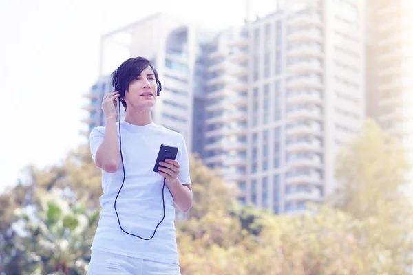 Happy Guy Walking Using Smart Phone Listen Music Headphones Happy — Stock Photo, Image