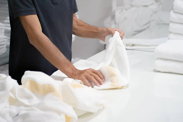 Hands Caucasian Male Laundry Hotel Worker Folds Clean White Towel — Stock Photo, Image