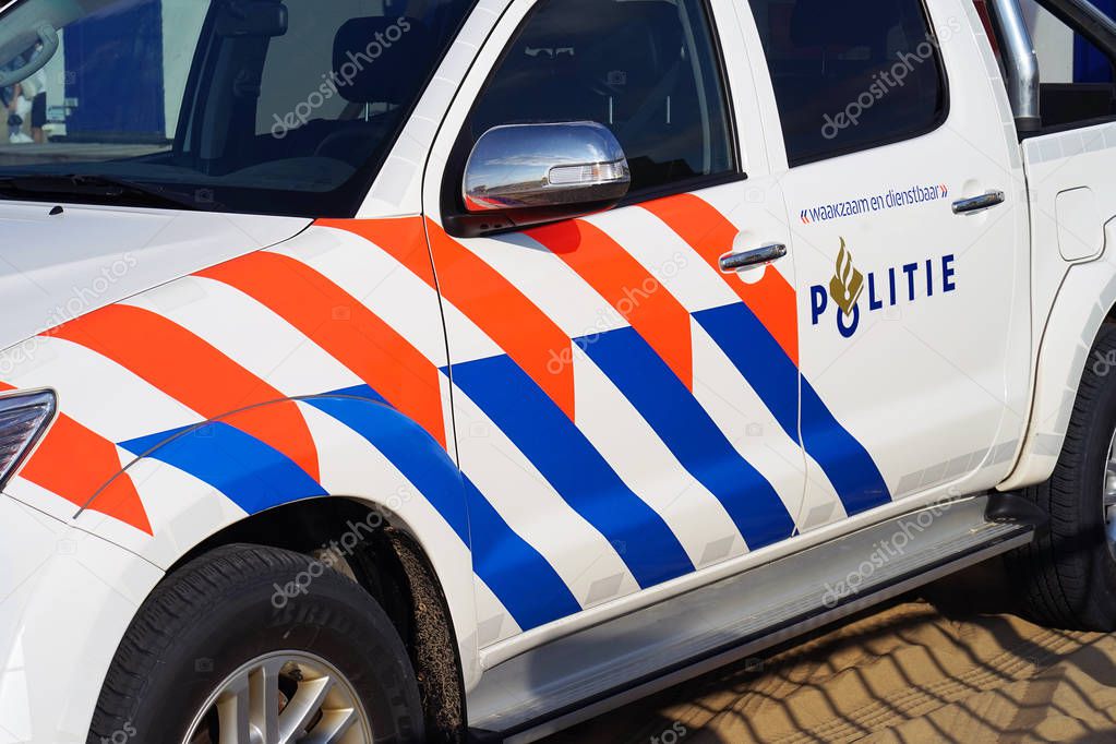 A Dutch police car with text and logo. Nobody in the vehicle. 2 September 2018. Den Haag. Netherlands