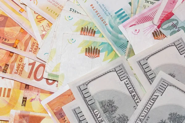 Izraelski pieniądze notatki i tło dolarów — Zdjęcie stockowe
