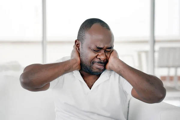 Pain in the neck of a man from fatigue. Tired neck. — Stock Photo, Image