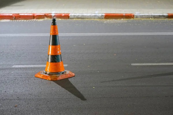 Road cone on the asphalt. Red caps on the road — Stock Photo, Image